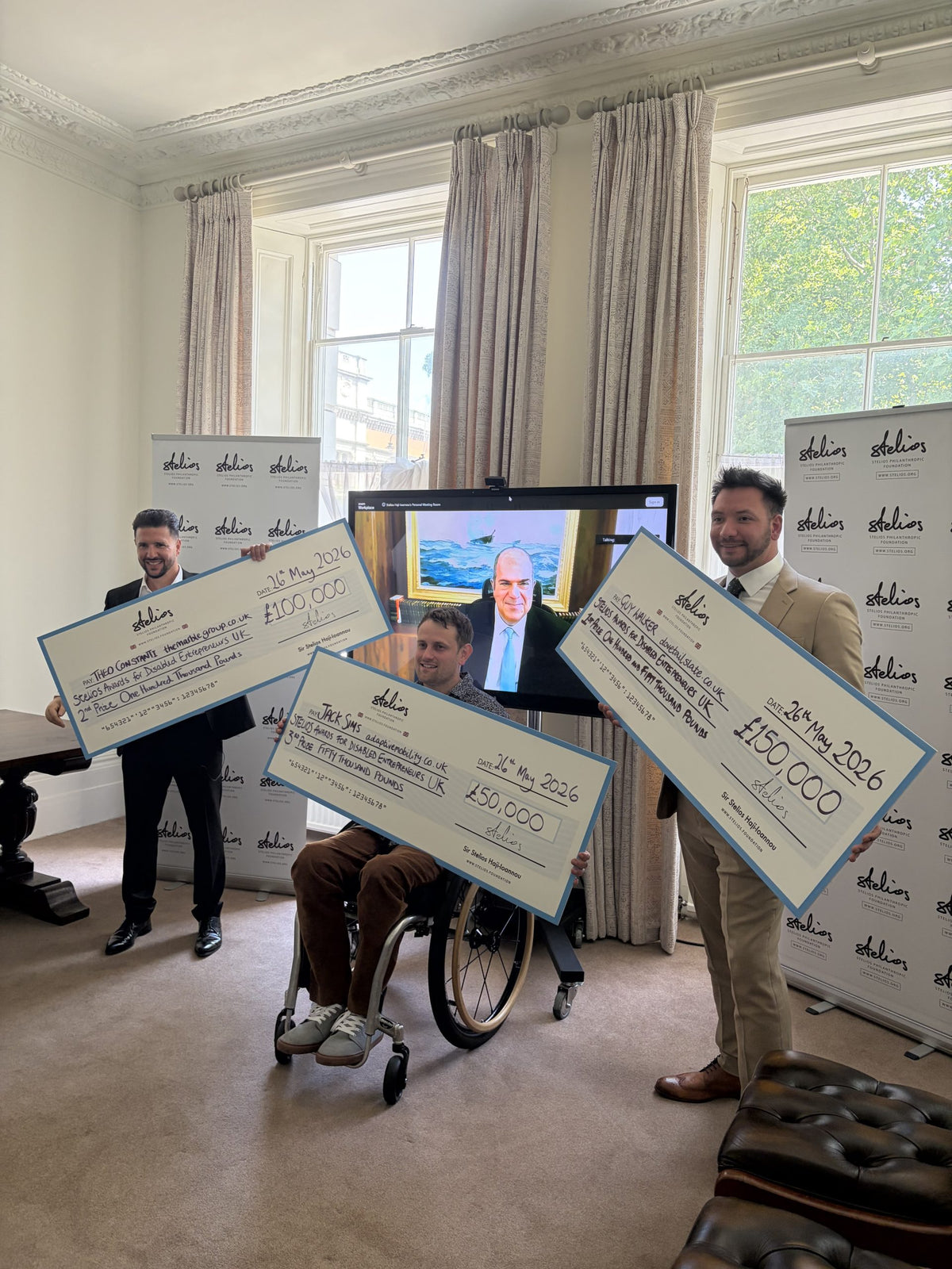 Winners of the 2026 Stelios Awards for Disabled Entrepreneurs holding their prize cheques.